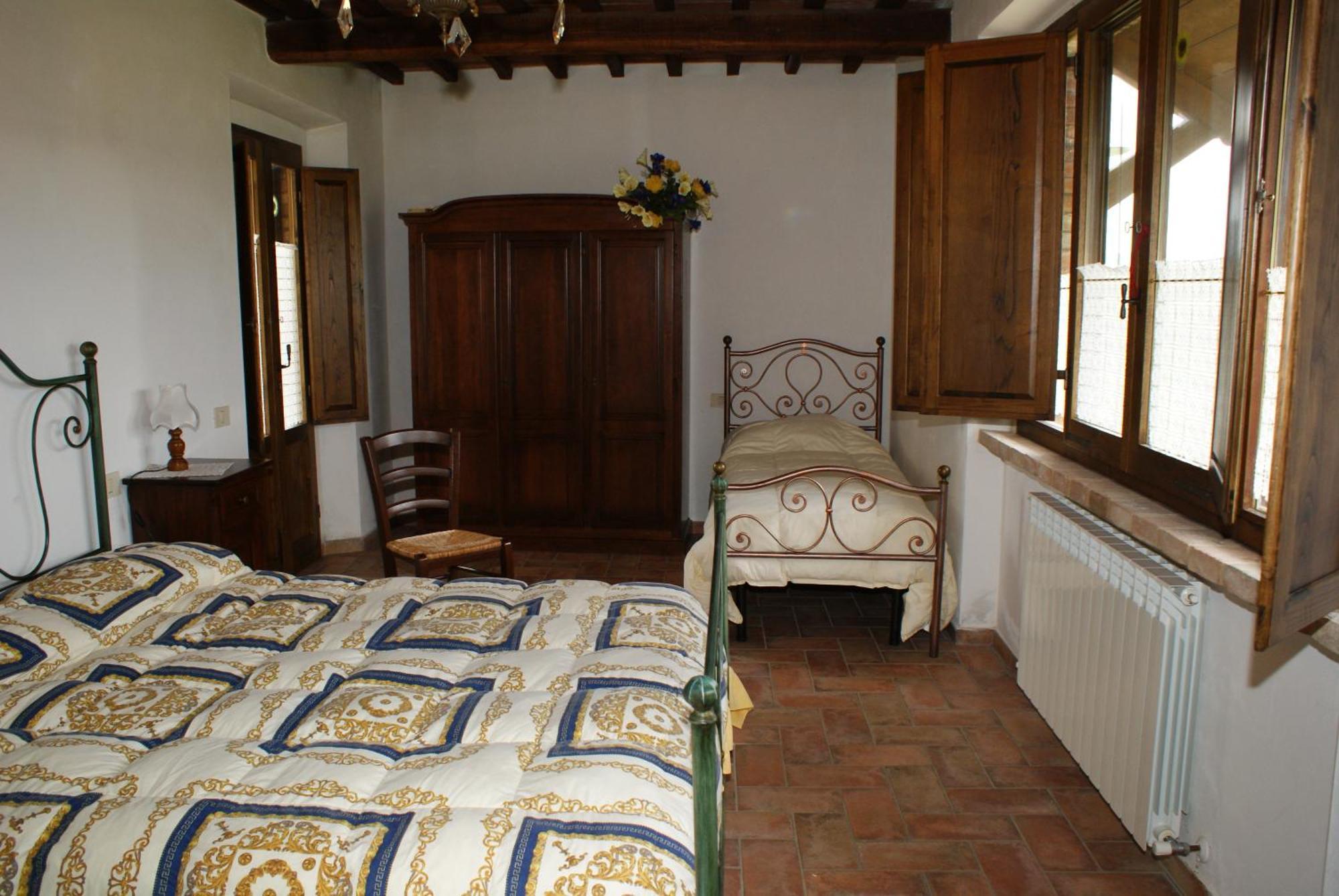 Villa La Rocca Della Magione Monteriggioni Habitación foto